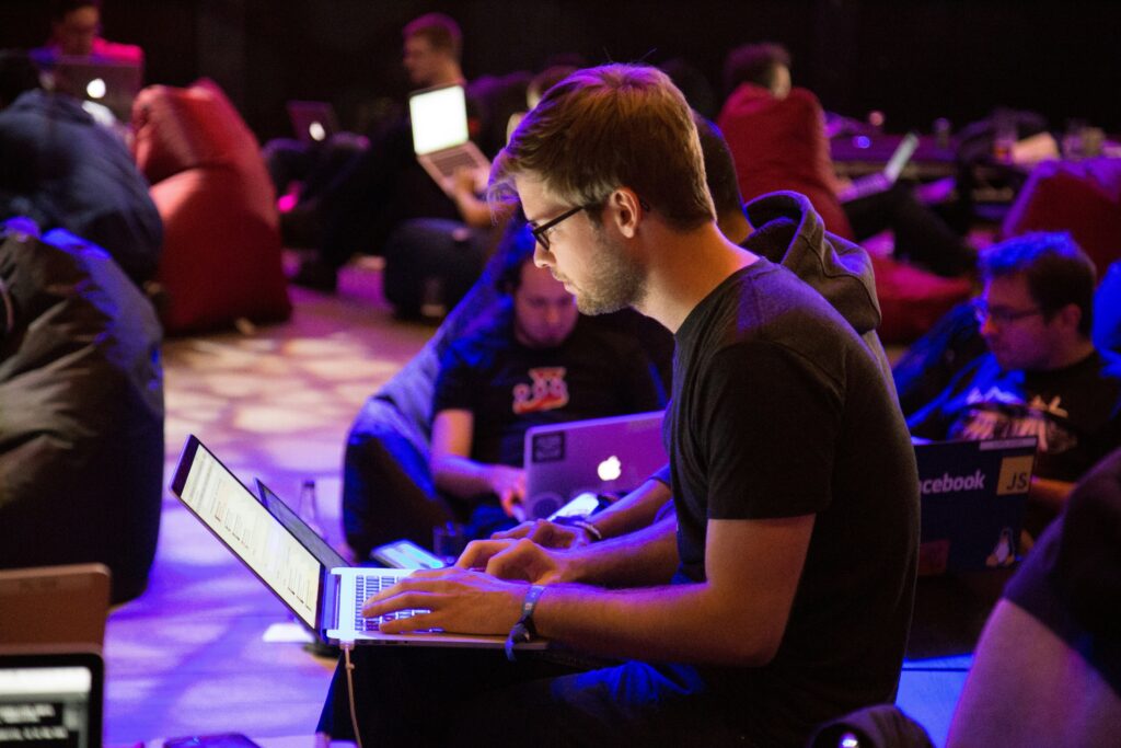 a man using a notebook during an event